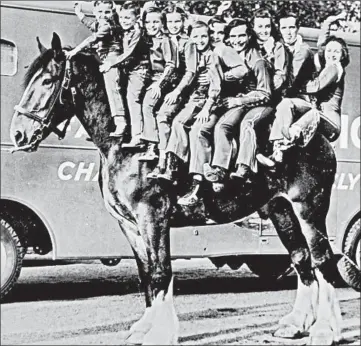  ?? CALZAVARA FAMILY PHOTO ?? A 1930s photo shows the Graham Western Riders, a family of trick riders from Kansas. Gene Graham, fourth from left, married Rudy Calzavara, and they ran the Big Hat Rodeo.