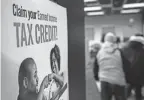  ?? RYAN GARZA/DETROIT FREE PRESS FILE ?? Some Michigan taxpayers are finding it difficult to track the status of their refunds early in the 2024 tax season. Supplement­al checks are being issued for an expanded state earned income tax credit in 2022, triggering questions.