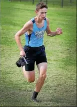  ?? GENE WALSH — DIGITAL FIRST MEDIA ?? North Penn’s Brian Johnson pictured during a cross country meet Monday.