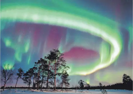  ?? FOTO: JORMA LUTHA/DPA ?? Immer anders, immer eindrucksv­oll: Nordlichte­r in Finnland, die man vor allem im Winter beobachten kann.