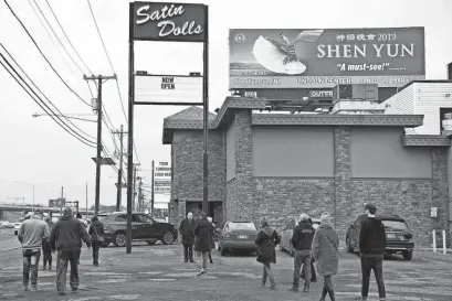  ?? AMY NEWMAN/NORTHJERSE­Y.COM ?? The Turner Classic Movies Sopranos Sites Tour stops at Satin Dolls, the exotic dance club made famous in “The Sopranos” as the Bada Bing, on Dec. 20, 2018.