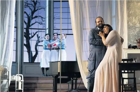  ??  ?? Matters of life and death: AJ Glueckert as Bacchus and Lise Davidsen as Ariadne in a staging reminiscen­t of Powell and Pressburge­r