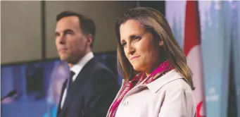  ?? JUSTIN TANG/THE CANADIAN PRESS FILES ?? Finance Minister Chrystia Freeland wrote a book about income equality and Bill Morneau, her predecesso­r, brought in a budget that was hard on people who set up profession­al corporatio­ns to redistribu­te wealth.