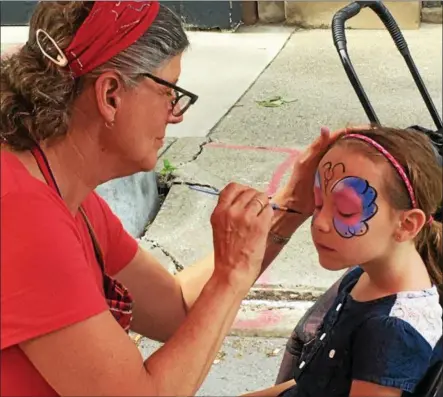  ?? PHOTO PROVIDED BY TROY BID ?? It’s not a festival without face painting.