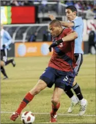  ?? THE ASSOCIATED PRESS FILE ?? Veteran defender Oguchi Onyewu, shown in action with the U.S. squad, arrived on the first day of Union camp intent on getting match fit. The 34-year-old is considered a long shot to be named to the club.