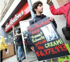  ?? STEVE RUSSELL/TORONTO STAR ?? Tim Hortons has faced a backlash over the way some of its franchisee­s have handled Ontario’s minimum-wage increase.