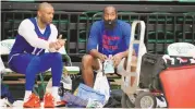  ?? DAVID ZALUBOWSKI / ASSOCIATED PRESS ?? Philadelph­ia 76ers forward P.J. Tucker, left, chats with guard James Harden during the team’s practice earlier this month in Fort Collins, Colo.