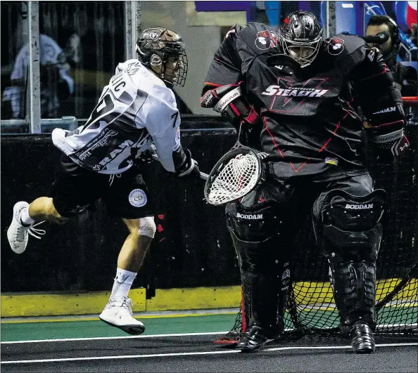  ?? — GARRETT JAMES ?? New Westminste­r Salmonbell­ies goaltender Eric Penney, right, pictured while playing for the National Lacrosse League’s Vancouver Stealth, was a Western Lacrosse League first-team all-star, the league’s outstandin­g goalie and a co-rookie-of-the-year...