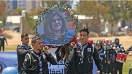  ?? (AFP) ?? Palestinia­n youth hold a mock funeral for journalist Shireen Abu Akleh in Gaza City last week