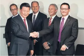  ?? Picture / Greg Bowker ?? Chinese President Xi Jinping shakes hands with Labour MP Raymond Huo, with Labour MP Andrew Little (left) and former Labour MPs David Shearer and Phil Goff in attendance during the premier’s 2014 visit.