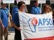  ?? ADAM FARENCE — DIGITAL FIRST MEDIA ?? Union members belonging to West Chester University’s faculty protested on the university’s campus Sept. 7.