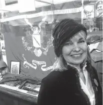  ?? JOHN DEMONT • THE CHRONICLE HERALD ?? Rosealee Peppard Lockyer stands in front of a Remembranc­e Day display on Friday at the Army Museum Halifax Citadel. The display commemorat­es her war-hero father Herb Peppard.