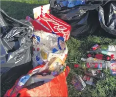  ??  ?? Bottles and food containers were left on the recreation ground as school leavers celebrated the end of term - which a council worker had to clear up