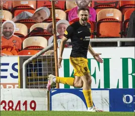  ?? Picture: SNS ?? Alan Forrest celebrates his late winner for Livingston.