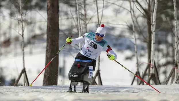  ?? Foto: imago images/Ryu Seung-Il ?? Kurventech­nik: Den Schlitten kriegt Andrea Eskau beim Langlauf gut um die Kurve.