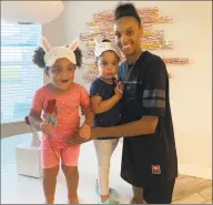  ?? Contribute­d photo ?? The Connecticu­t Sun’s DeWanna Bonner left her daughters, Cali, left, and Demi at home with relatives while she’s playing in Florida. “It’s definitely tough,” Bonner said. “I have a great support system who watches them, and I pretty much pop on FaceTime all day.”