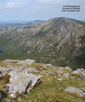  ??  ?? Loch Raonasgail and the peak of Tahabhal from Cracabhal, Lewis
Below: His other guide books