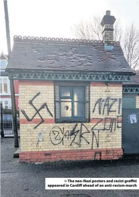  ??  ?? &gt; The neo-Nazi posters and racist graffiti appeared in Cardiff ahead of an anti-racism march