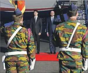  ?? CP PHOTO ?? Prime Minister Justin Trudeau is greeted by Belgium Prime Minister Charles Michel as he arrives in Brussels, Belgium, Wednesday to attend the NATO Summit.