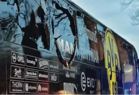  ?? Martin Meissner / Associated Press files ?? A bombing April 11 shattered windows on the Borussia Dortmund soccer team’s bus. Authoritie­s say a suspect tried to disguise the attack as Islamic terrorism.