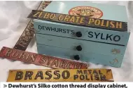  ??  ?? > Dewhurst’s Silko cotton thread display cabinet, and a set of four advertisin­g tin plate shelf edgers