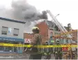  ?? KYLE DARBYSON ?? Sault Ste. Marie firefighte­rs respond to a Wednesday morning blaze at 647 Queen St. E., the home of the former Silly Rabbit Vape Shop.