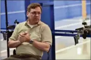  ?? LISA MARIE PANE — THE ASSOCIATED PRESS ?? In this photo taken Saturday in Dahlonega, Georgia, JP O’Connor, a USA Shooting instructor, talks with students at a gun range at the University of North Georgia.