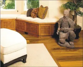  ?? COURTESY OF CHRISTOPHE­R GRUBB ?? This midtone brown flooring, made of Hawaiian Koa wood, will always be in style.