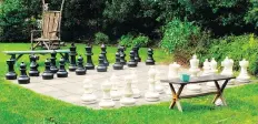  ?? ASSOCIATED PRESS DEAN FOSDICK/THE ?? An outdoor chess set in the garden provides as much satisfacti­on as utility while giving people an opportunit­y to connect with nature.
