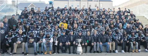  ??  ?? The Argos pose for a team photo with the Grey Cup days after winning the CFL championsh­ip.