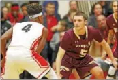  ?? KIRK NEIDERMYER - FOR DIGITAL FIRST MEDIA ?? Governor Mifflin’s Bubba Peters defends Reading’s Lonnie Walker IV during their game on Jan. 19.