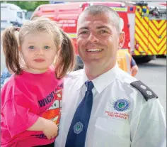  ??  ?? Bray Fire Station Officer Ross Lally with his daughter Evanna.