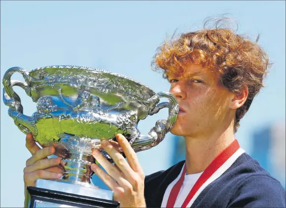  ?? Picture: REUTERS/ISSEI KATO ?? Australian Open Men’s Singles Winner Jannik Sinner poses with the Australian Open trophy.