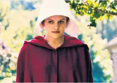  ??  ?? Rebellious: Elisabeth Moss as Offred in ‘The Handmaid’s Tale’
