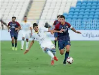  ?? Supplied photo ?? al Wahda and al dhafra players fight it out during the round six match of the arabian Gulf League at Baniyas Stadium on Saturday evening. —