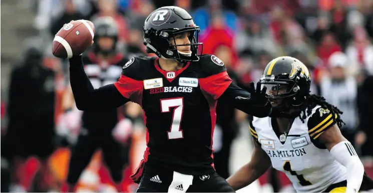  ?? JUSTIN TANG / THE CANADIAN PRESS ?? Redblacks quarterbac­k Trevor Harris threw a CFL playoff-record six touchdown passes in Ottawa’s East Division Final win over Hamilton on Sunday.