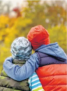  ?? CONTRIBUTE­D ?? Kara Hebb’s sons show off their beloved slouchie beanies from her online clothing business, Saelvage. All items are handmade with quality fabrics, meant to last children for several years.