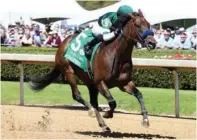  ?? Submitted photo ?? ■ Edgeway, under jockey Joel Rosario, crosses the wire for a three-quarter length victory in her first stakes victory. Photo courtesy of Coady Photograph­y