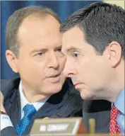  ?? Mandel Ngan AFP/Getty Images ?? DEMOCRAT ADAM SCHIFF, left, and Republican Devin Nunes, leaders of the House Intelligen­ce Committee, work together despite their difference­s.