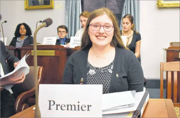  ?? TONY DAVIS/THE GUARDIAN ?? Susanna Hamilton, a student at Grace Christian School, was the acting premier during the 31st annual Rotary Youth Parliament held in Charlottet­own on Friday and Saturday. The exercise gave students from across the province some hands-on experience of what it’s like to be a provincial MLA.