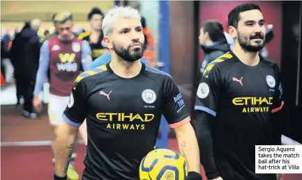  ??  ?? Sergio Aguero takes the match ball after his hat-trick at Villa