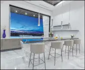  ?? Kristen Routh-Silberman ?? Most rooms in the 10,030-square-foot Ascaya home, which sold for $10.5 million in July, provide stunning Strip views.