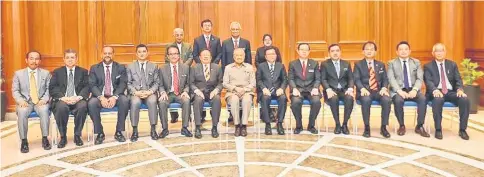  ??  ?? Dr Mahathir (seated centre), flanked by Abang Johari (left) and Shafie, in a photo call with members of the special committee and federal cabinet ministers prior to the meeting yesterday.