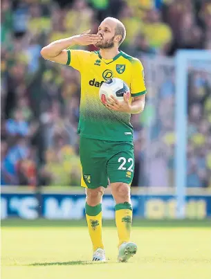  ?? MARC ATKINS GETTY IMAGES ?? Norwich striker Teemu Pukki scored a hat trick in his first home Premier League appearance, against Newcastle last Saturday. He leads the league with four goals in two games.