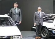  ?? (AFP) ?? This photo taken on January 13 shows Akio Toyoda (right) and Koji Sato (left) posing during the Tokyo Auto Salon festival in Tokyo