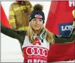  ?? GIOVANNI AULETTA — ASSOCIATED PRESS ?? Mikaela Shiffrin celebrates after taking third place in the women’s World Cup slalom in Flachau, Austria on Tuesday.