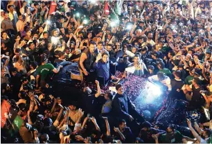  ?? AFP ?? PPP chairman Bilawal Bhutto waves to supporters during an election rally in Karachi. —