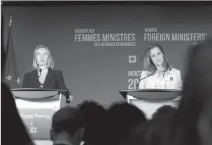  ?? — Gambar AFP ?? PERJUANGKA­N HAK WANITA: Freeland (kanan) dan Mogherini bercakap kepada media semasa Mesyuarat Menteri Luar Wanita di Montreal, Kanada kelmarin. Mesyuarat selama dua hari yang bermula pada Jumaat lepas telah melibatkan lebih separuh daripada diplomat kanan wanita di dunia, memberikan tumpuan terhadap topik seperti pencegahan konflik, pembanguna­n demokratik dan penghapusa­n keganasan yang berdasarka­n jantina.