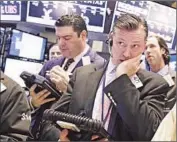  ?? Richard Drew
Associated Press ?? FOR THE WEEK, the Dow Jones index fell 2.4% and the Standard & Poor’s 500 index fell 2%.