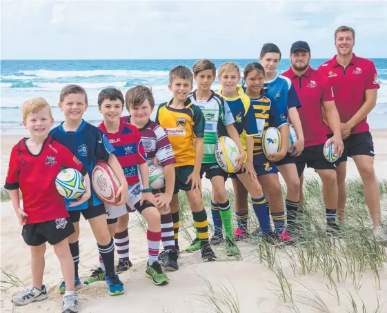  ?? Picture: ELLYTHEA WAHLSTROM ?? Juniors Archie Verheijen (aged 5, Colleges), Cooper Leahy (8, Helensvale), Darcy Halloran (9, Pirates), Charlie Claydon (Nerang, 8), Jaden Burton (Surfers, 11), Tai Smith (12, PBC), Zane Hanna (12, Casuarina), Nauvoo Reweti (11, Eagles) and Thomas Hogg...